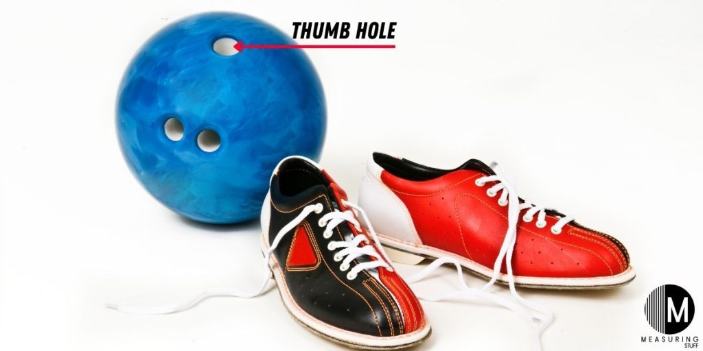 blue bowling ball and shoes