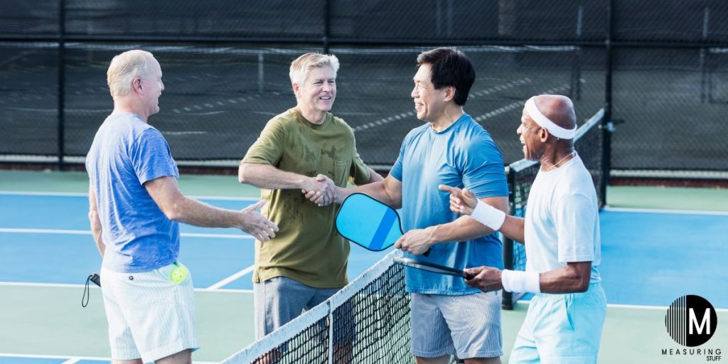 men playing pickleball