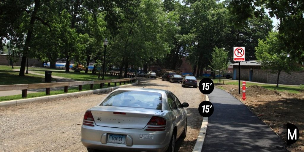 cars parked on street away from fire hydrant