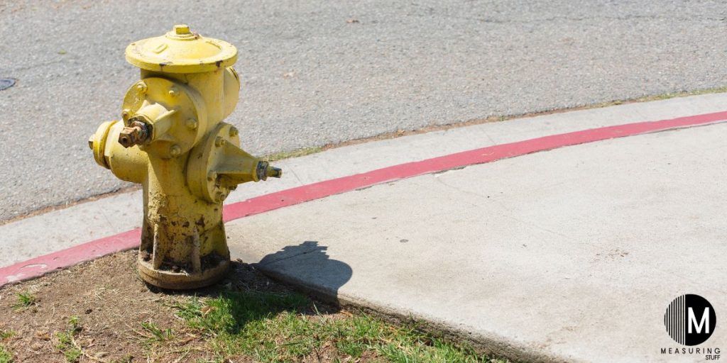 fire hydrant next to red curb