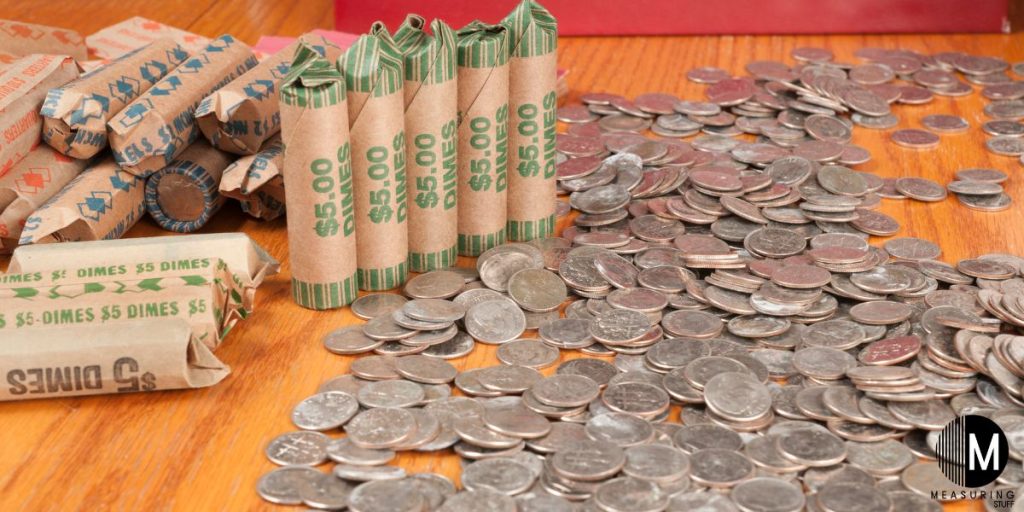 several rolls of dimes on a table