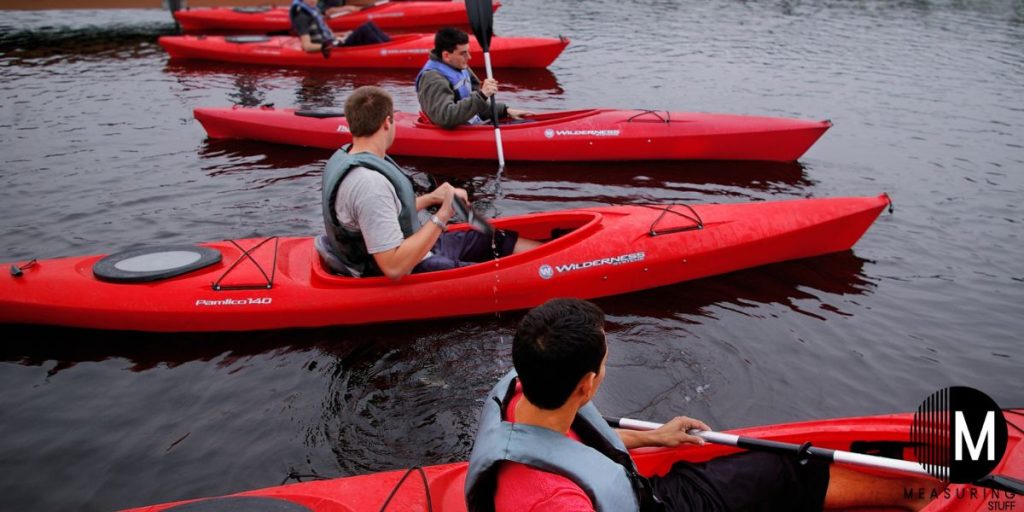 kayaks lining up for a race