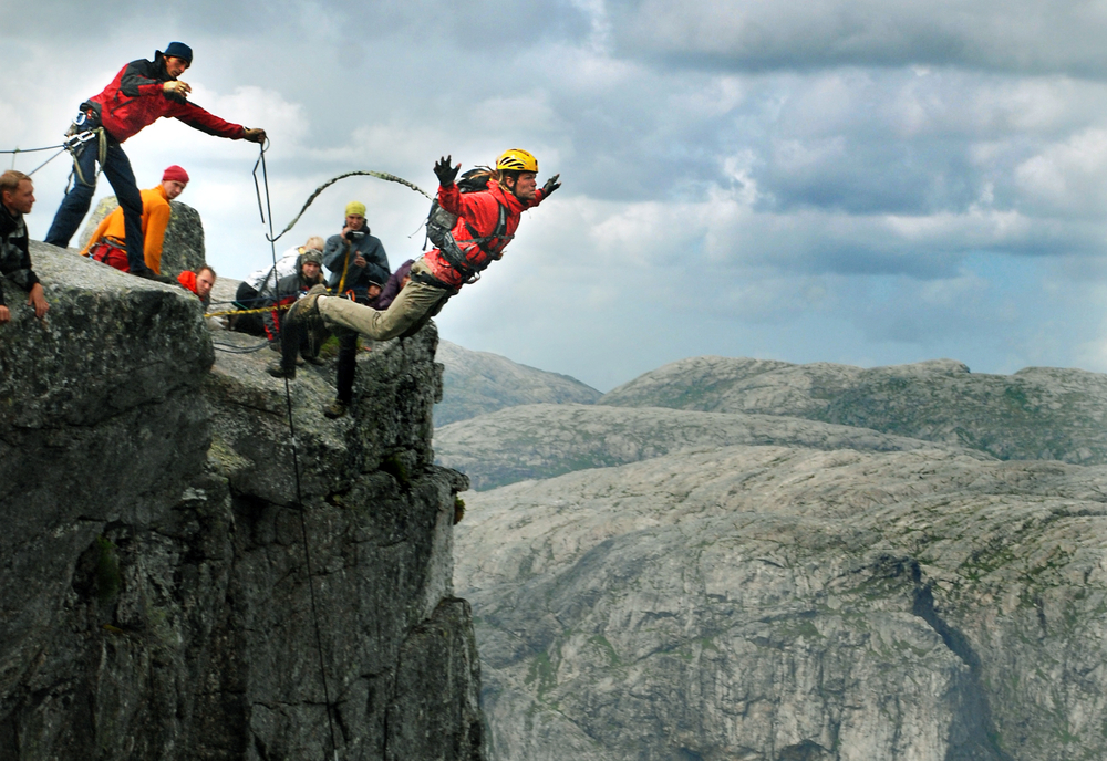 bungee jumpers on a cliff
