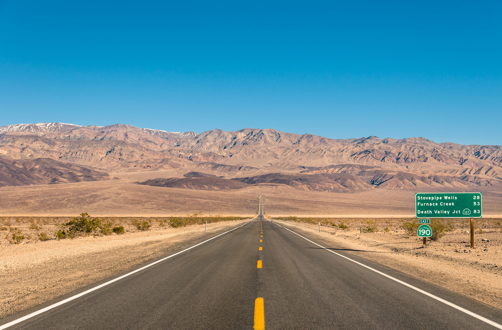 Death Valley, California - Empty infinite Road in the Desert