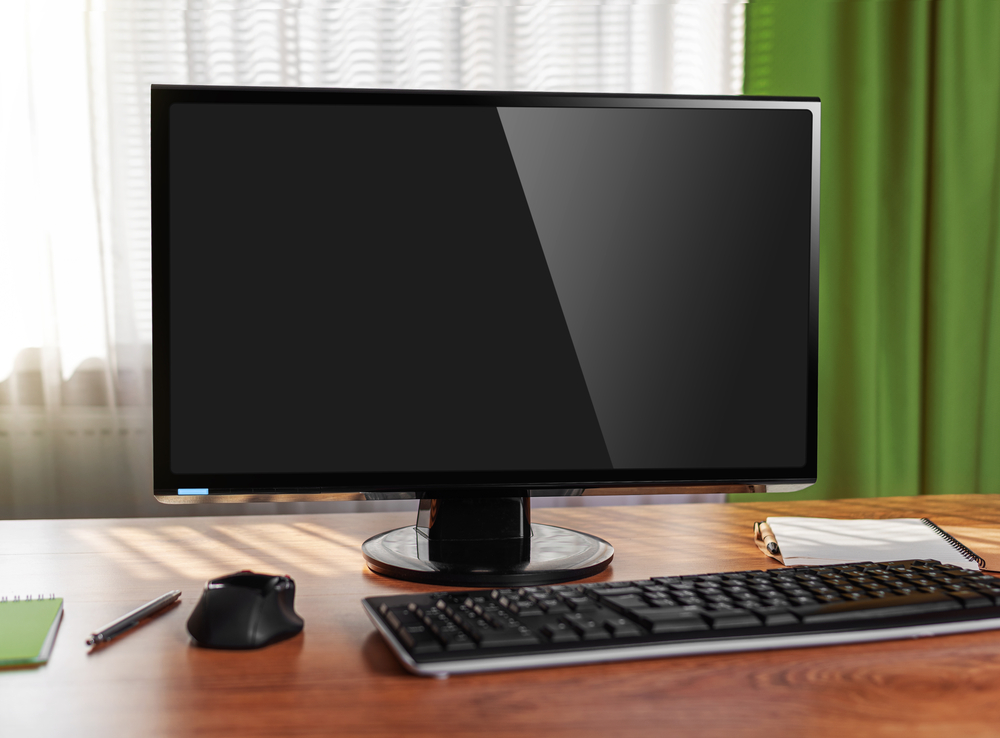 Personal computer on the table at home. Workplace.