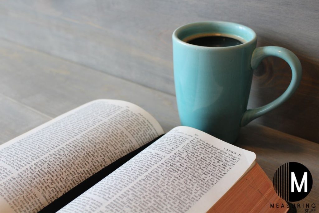 mug of coffee with an open book