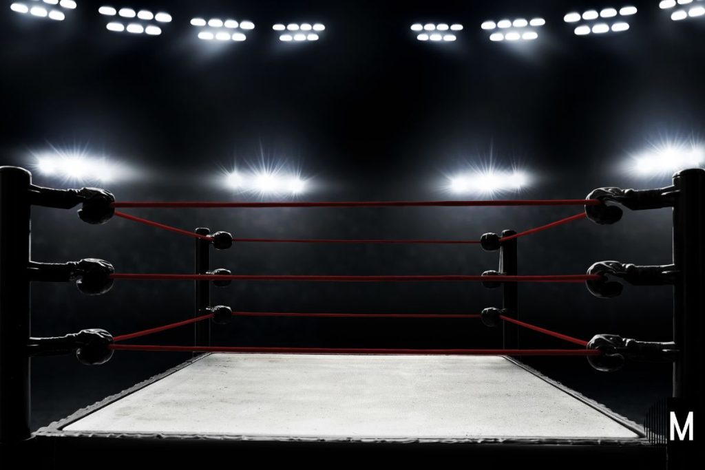 wrestling ring under lights