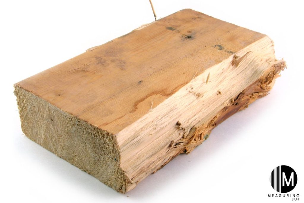 cut piece of 2x4 lumber that is cracked