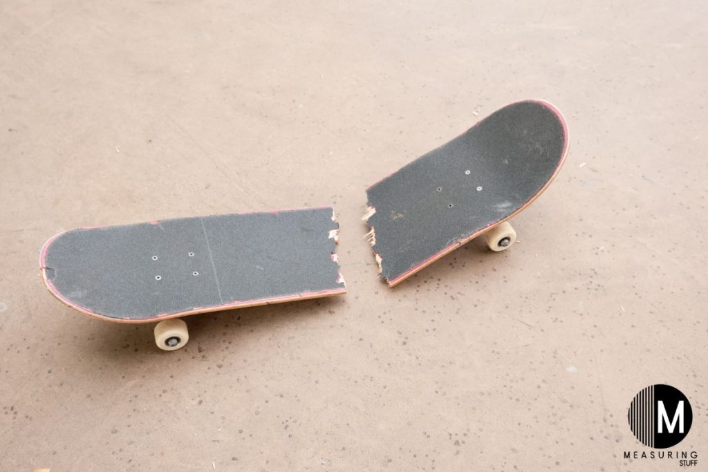 skateboard snapped apart