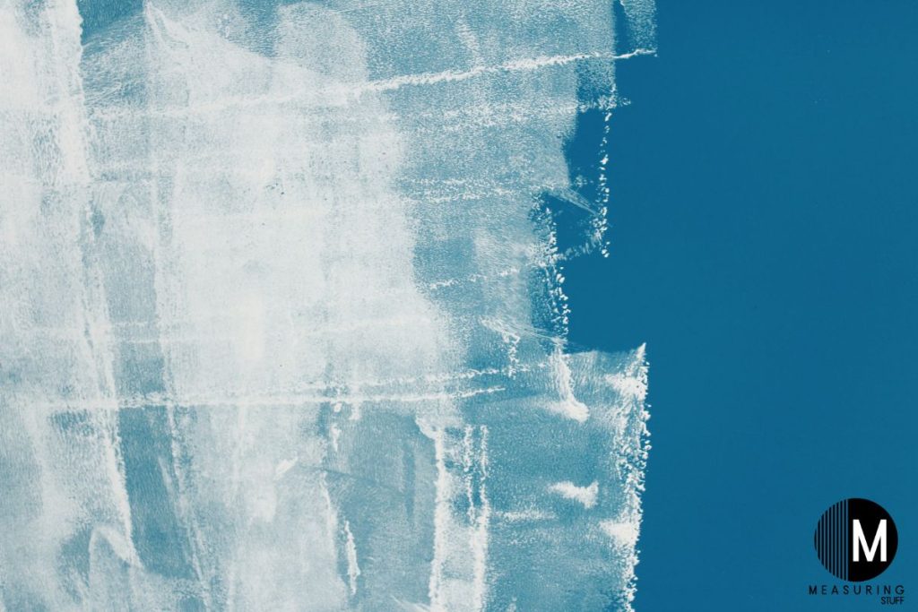 primer over blue painted wall