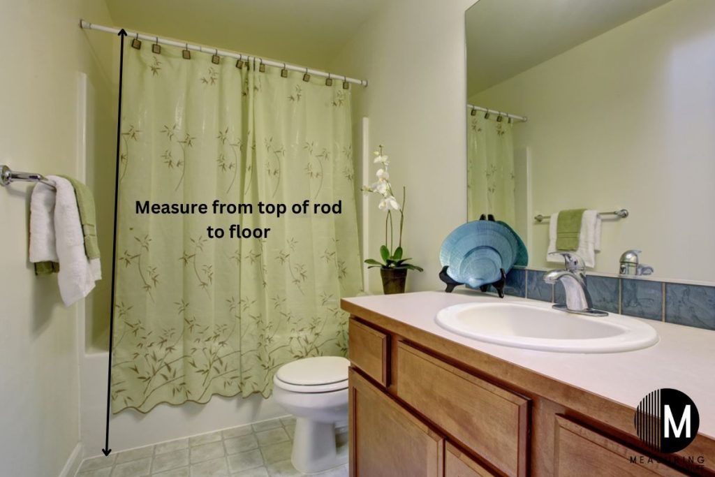shower curtain outside of tub