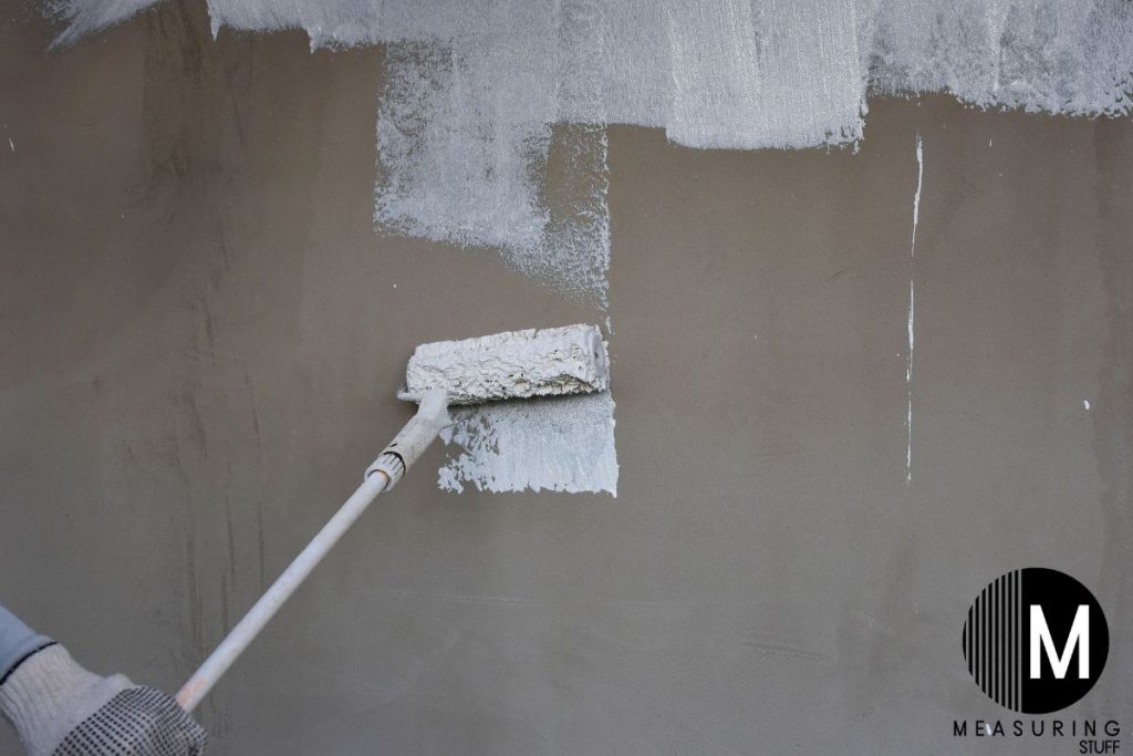 applying primer using a roller