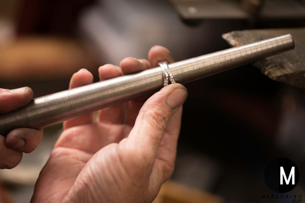jeweler resizing a ring