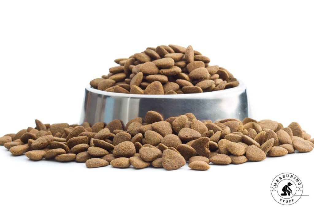 dry dog food in a metal bowl
