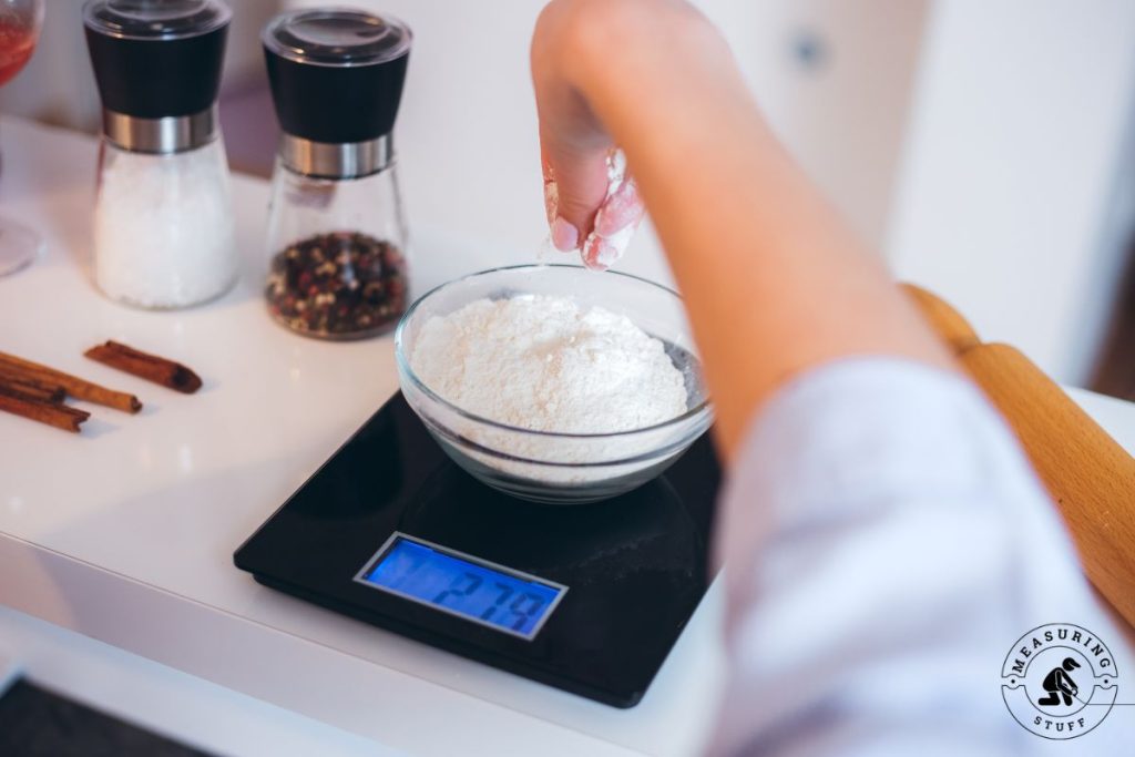 measuring flour on a scale