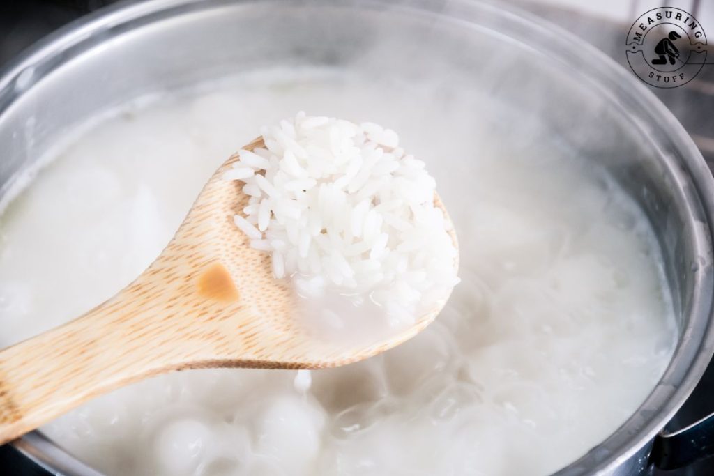 rice in a pot of hot water