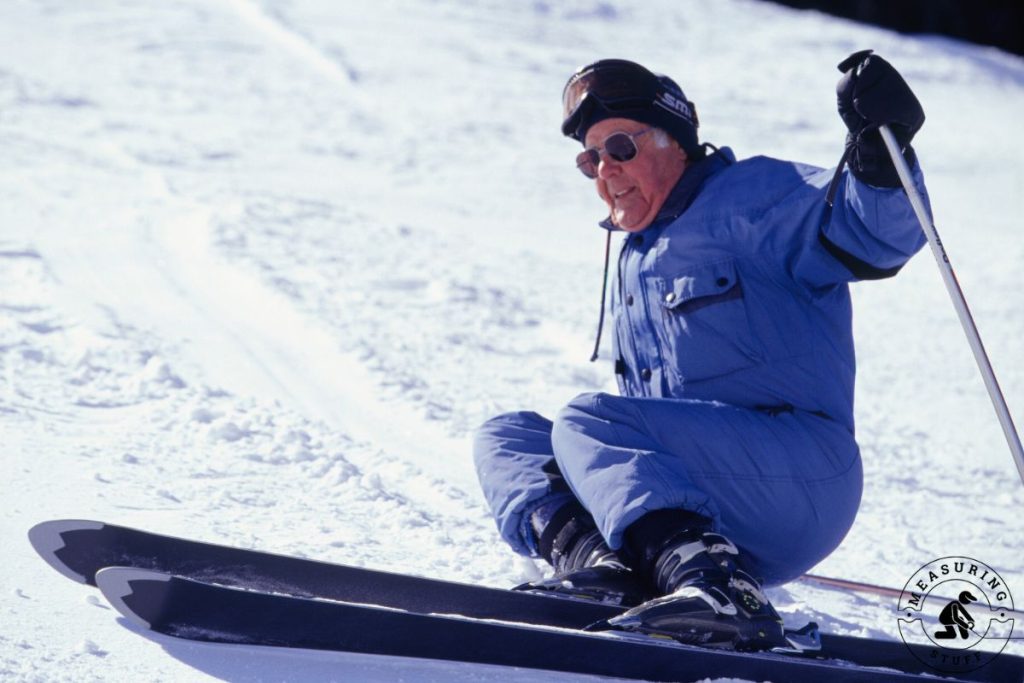 elderly man on ski slope