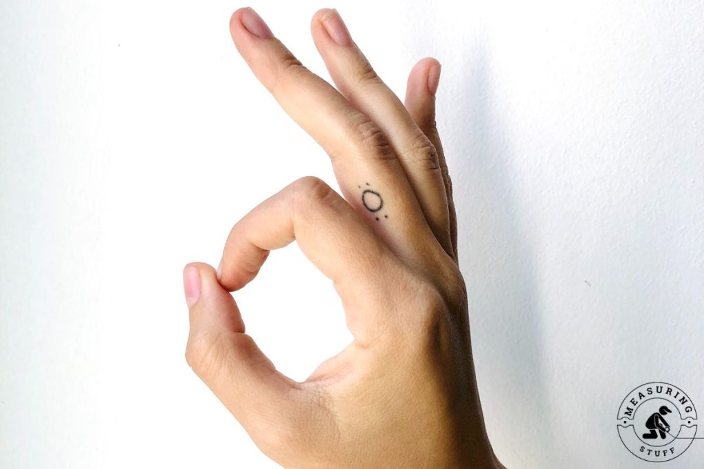 hand with thumb and point finger touching