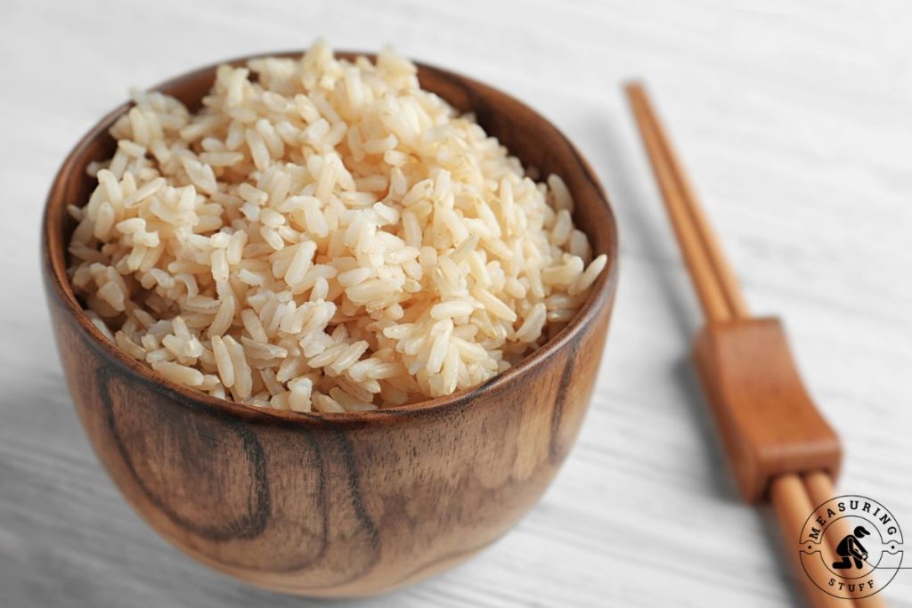 brown rice in a wooden bowl