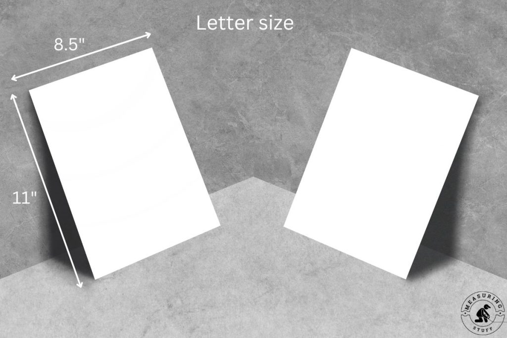 pair of letter size paper against a wall