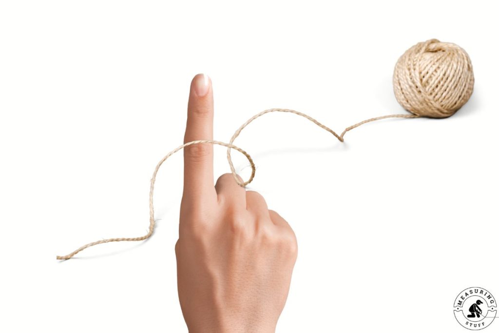ball of string and a finger