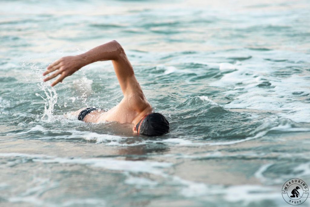 man swimming in the ocean