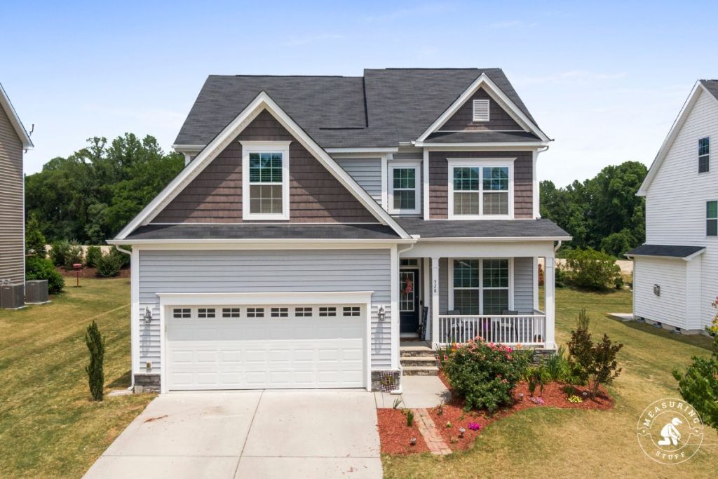 two story home with a garage