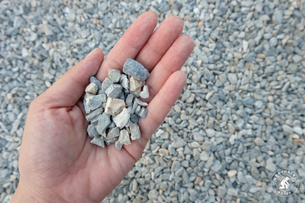 pieces of gravel in a hand