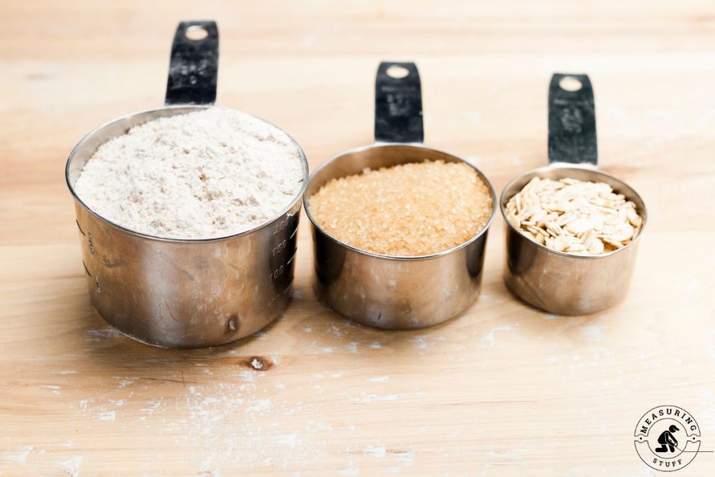 measuring cups with dry ingredients