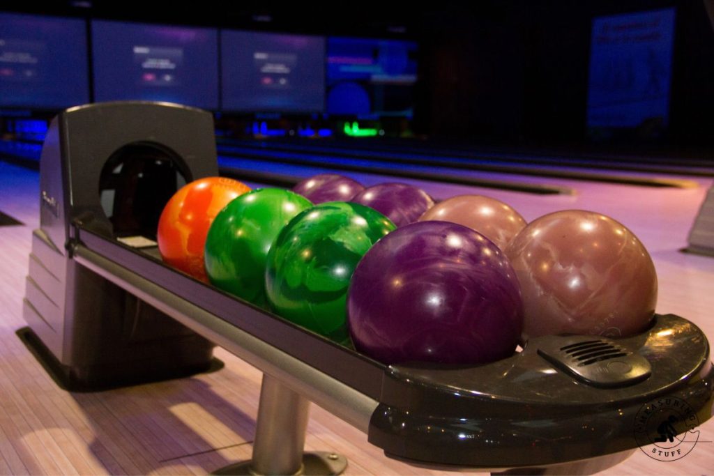 bowling balls on a rack