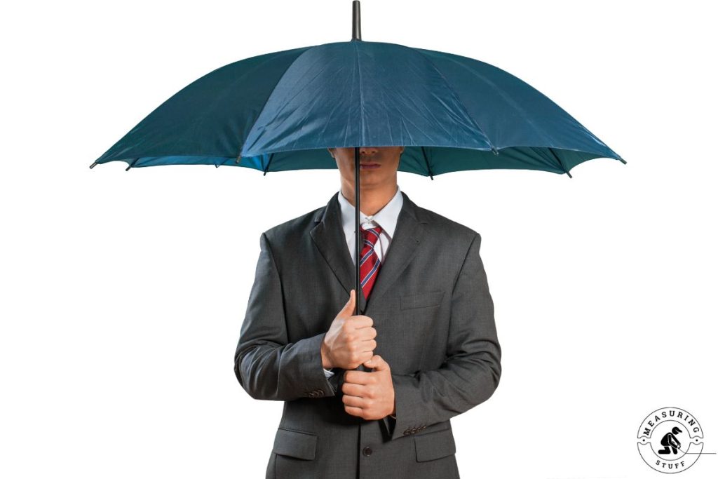 man holding an open umbrella