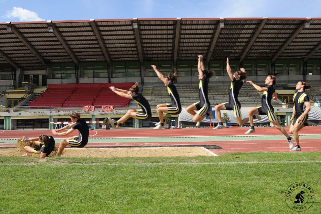 long jumper landing in sand pit