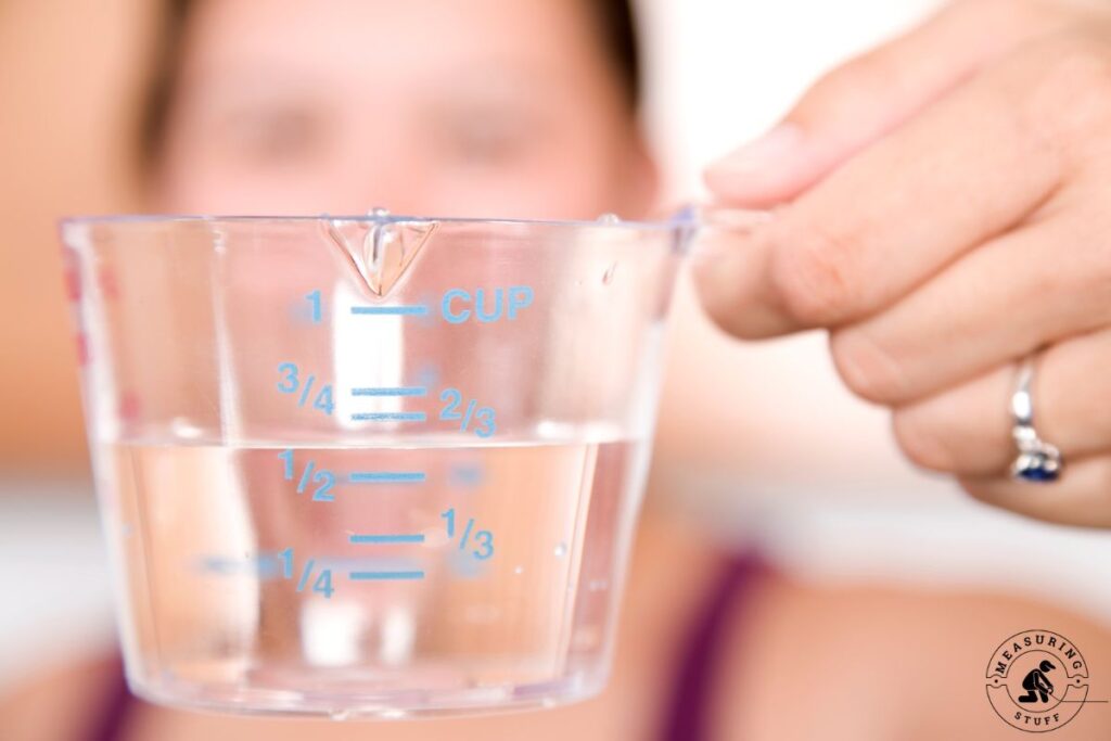liquid measuring cup with water