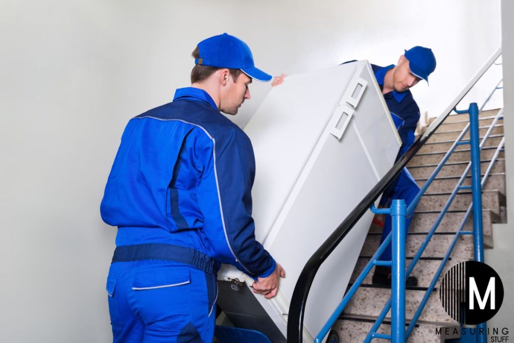 moving a refrigerator up stairs