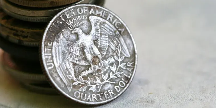 How Many Quarters Weigh 100 Grams?