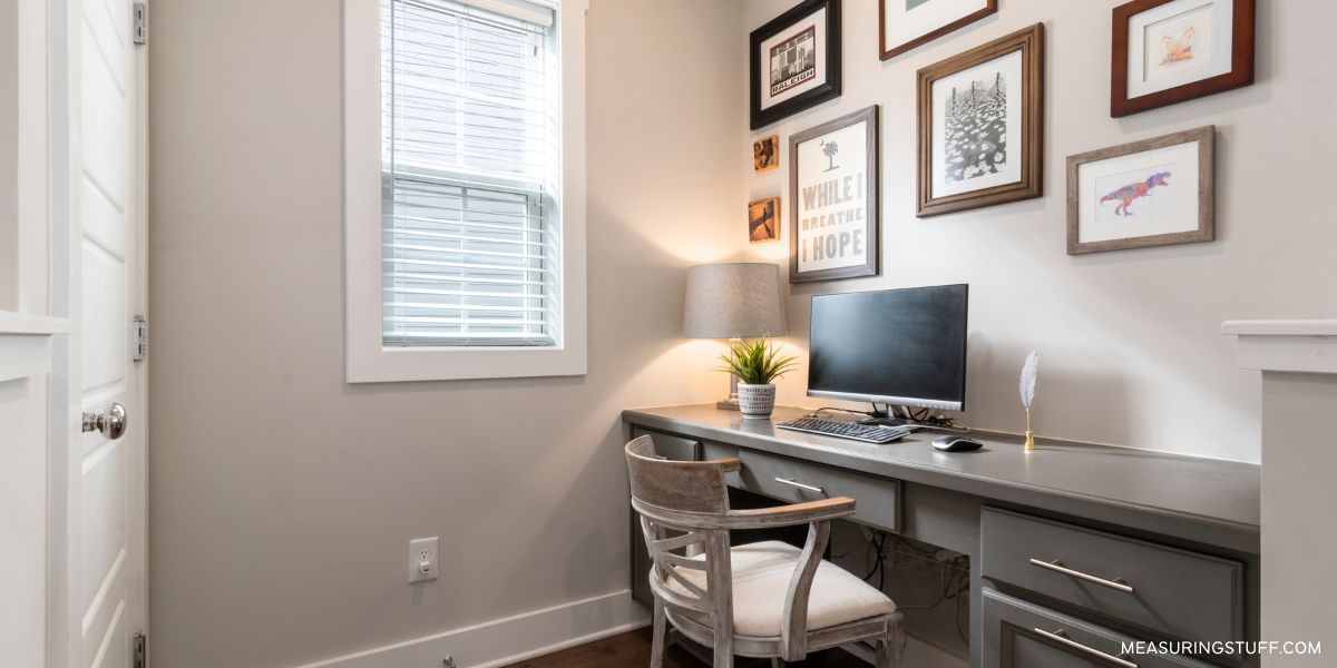 small home office with wall art