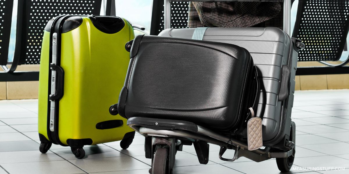 luggage on a airport dolly