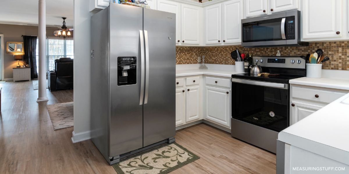 large 27 cubic foot refrigerator with french doors in a kitchen