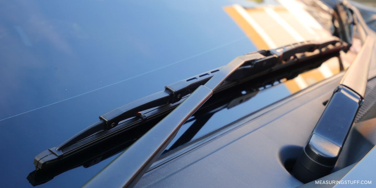 closeup of a wiper blade attached to vehicle