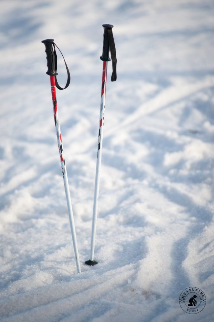 ski poles in the snow