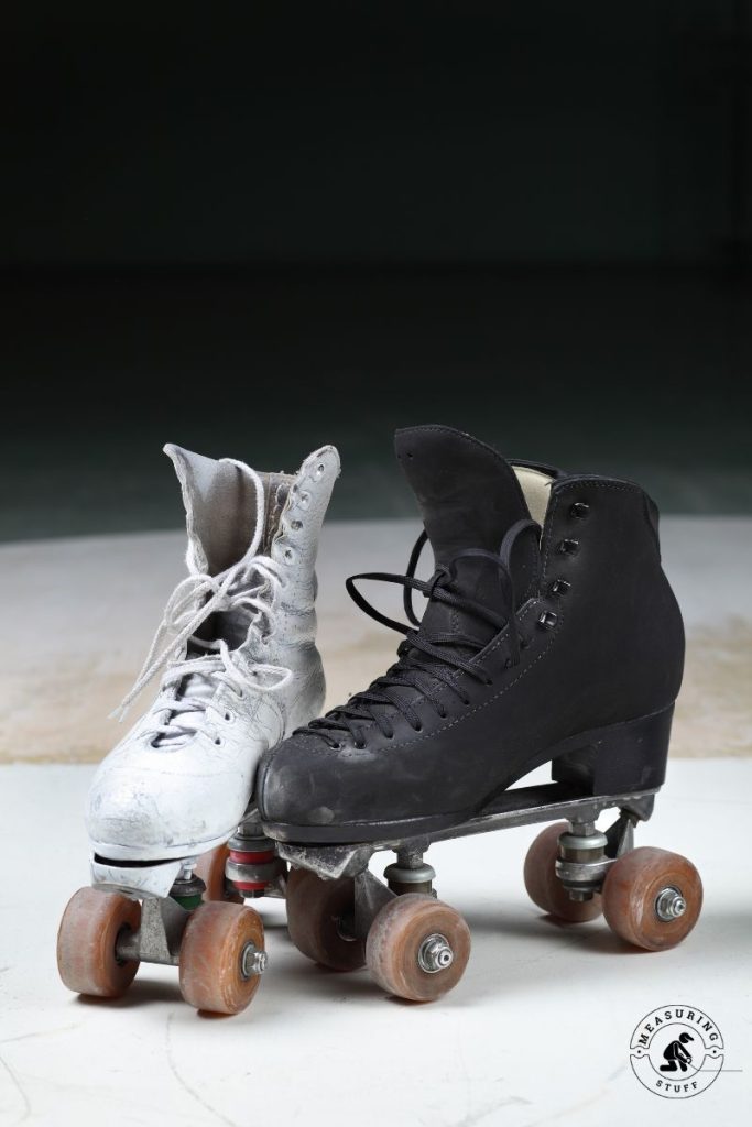used white and black roller skates