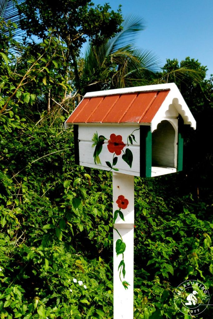 custom wooden made mailbox painted with flowers and birds