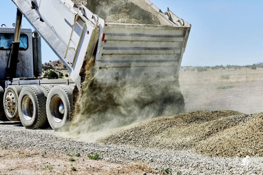 dump truck dumping gravel