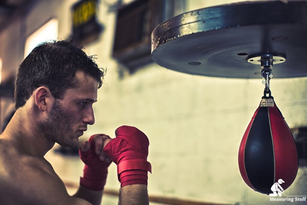 man using a speed bag