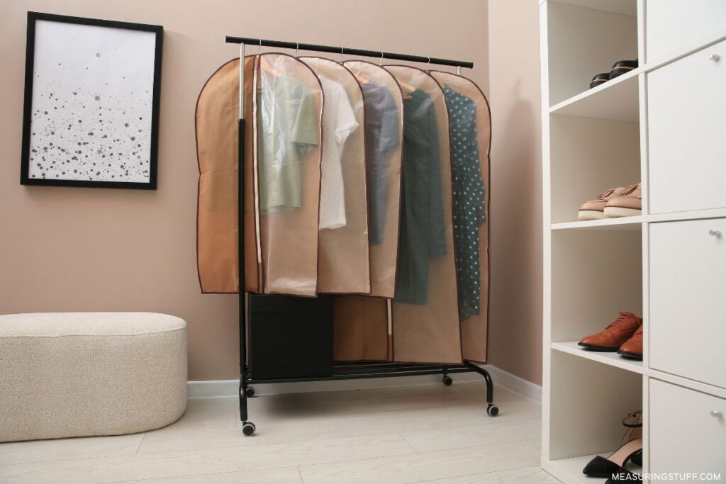 hanging garment bags with clothes