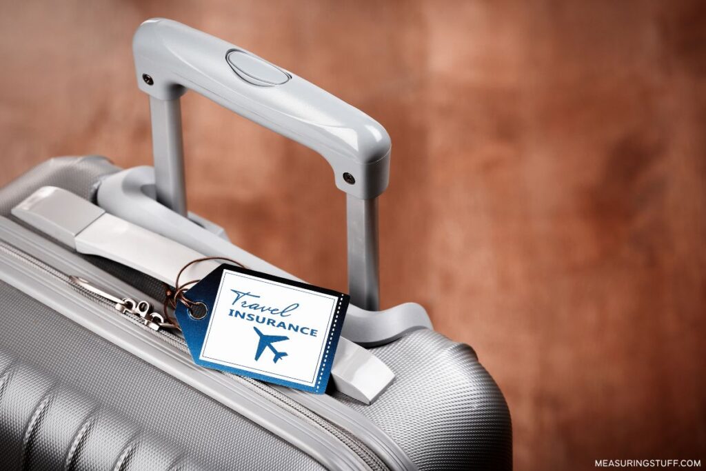 travel insurance luggage tag on hardshell luggage bag