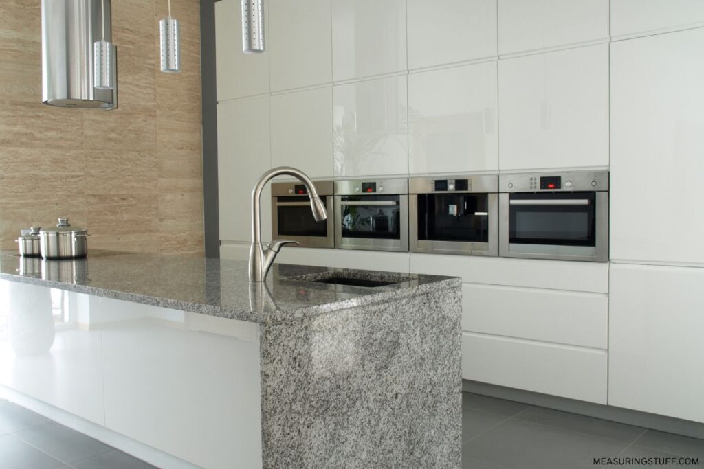 large kitchen island with quartz top