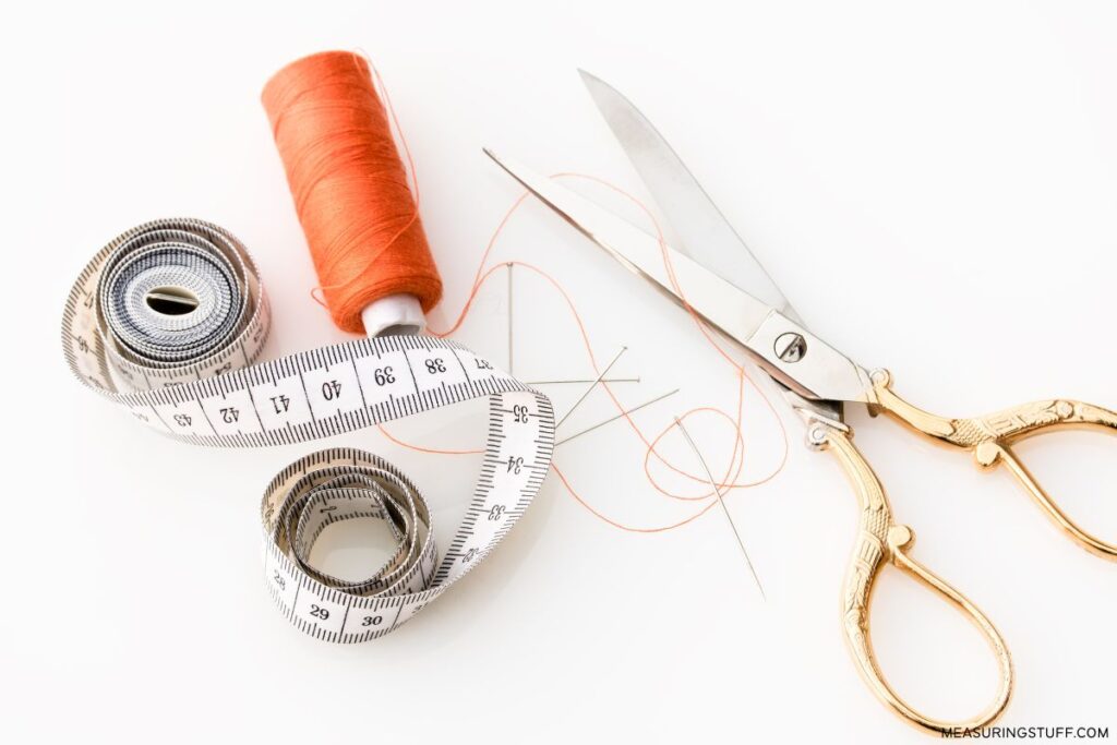 sewing tape, thread, scissors