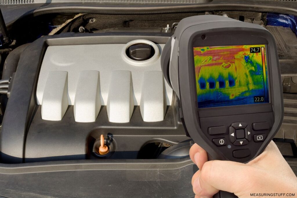 infrared pyrometer measuring temperature of car engine