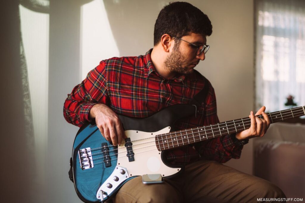 man playing bass guitar